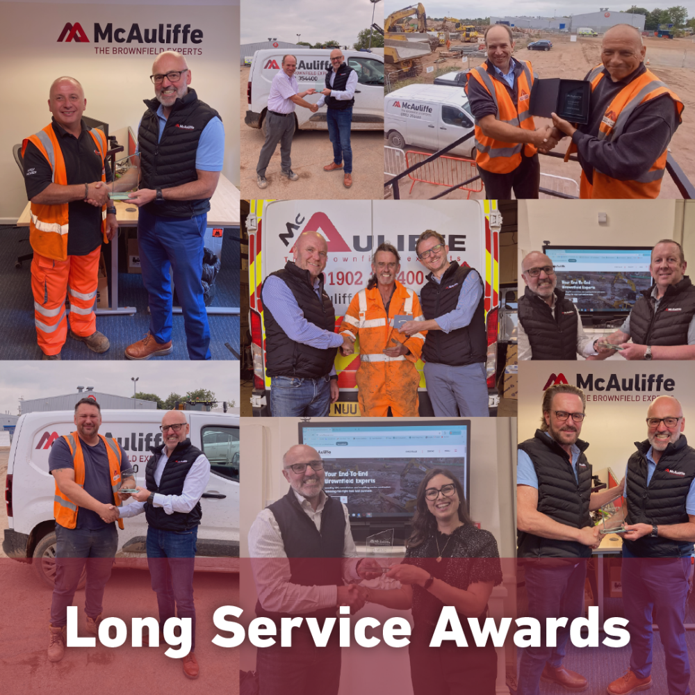 Long service McAuliffe staff members recieving their awards.